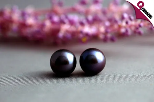 For QR89 get a Classically Stylish pair of Natural Fresh Water Black Pearl Earrings with Silver Studs (QR250 Value)